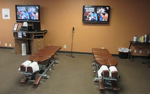 Photo of Optimal Health Auto Accident Injury Chiropractic's Spinal decompression tables